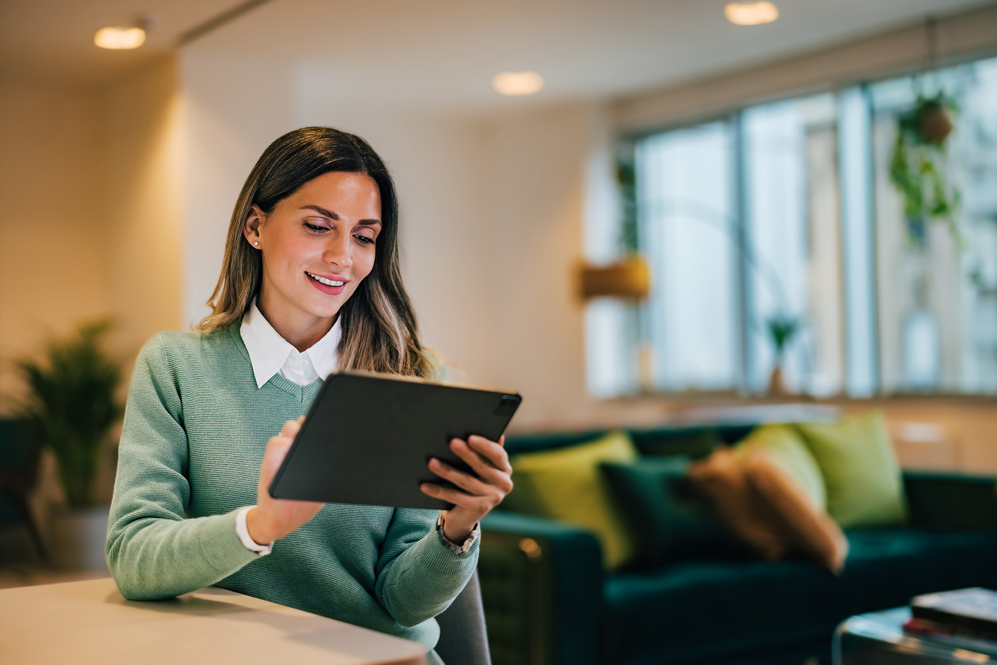 a business woman accessing financial resources from Integrated Tax Services