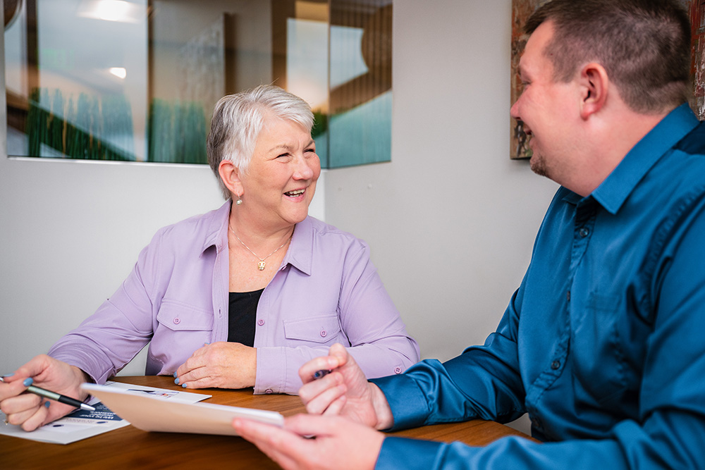 Jonathan Sits with a Client